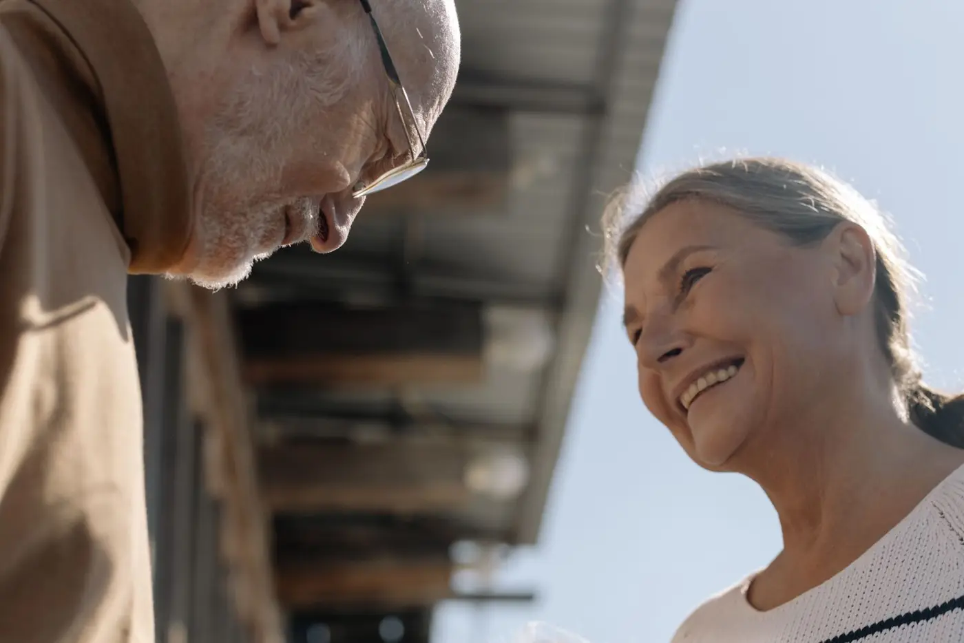 Older couple smiling outdoors